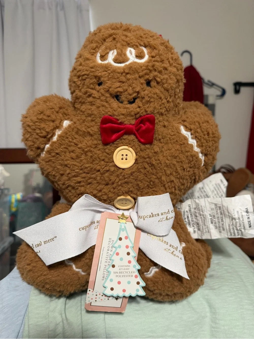 cupcakes & cashmere Brown Gingerbread Family Plush Holiday Pillow with Red Bow